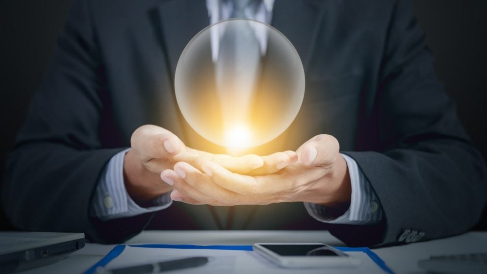 Business man with crystal ball